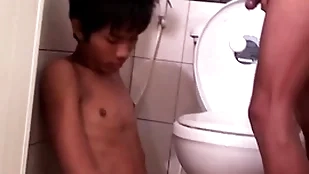 Asian bareback twink fucks pissing beam in doggystyle