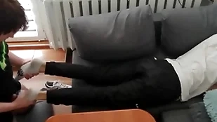 Young guy pays in foreign lands his bread with his wings